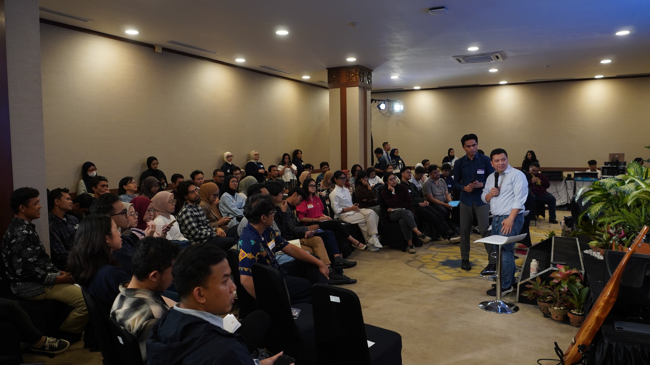 Jakarta Citizens' Assembly members deliberating during a town-hall session