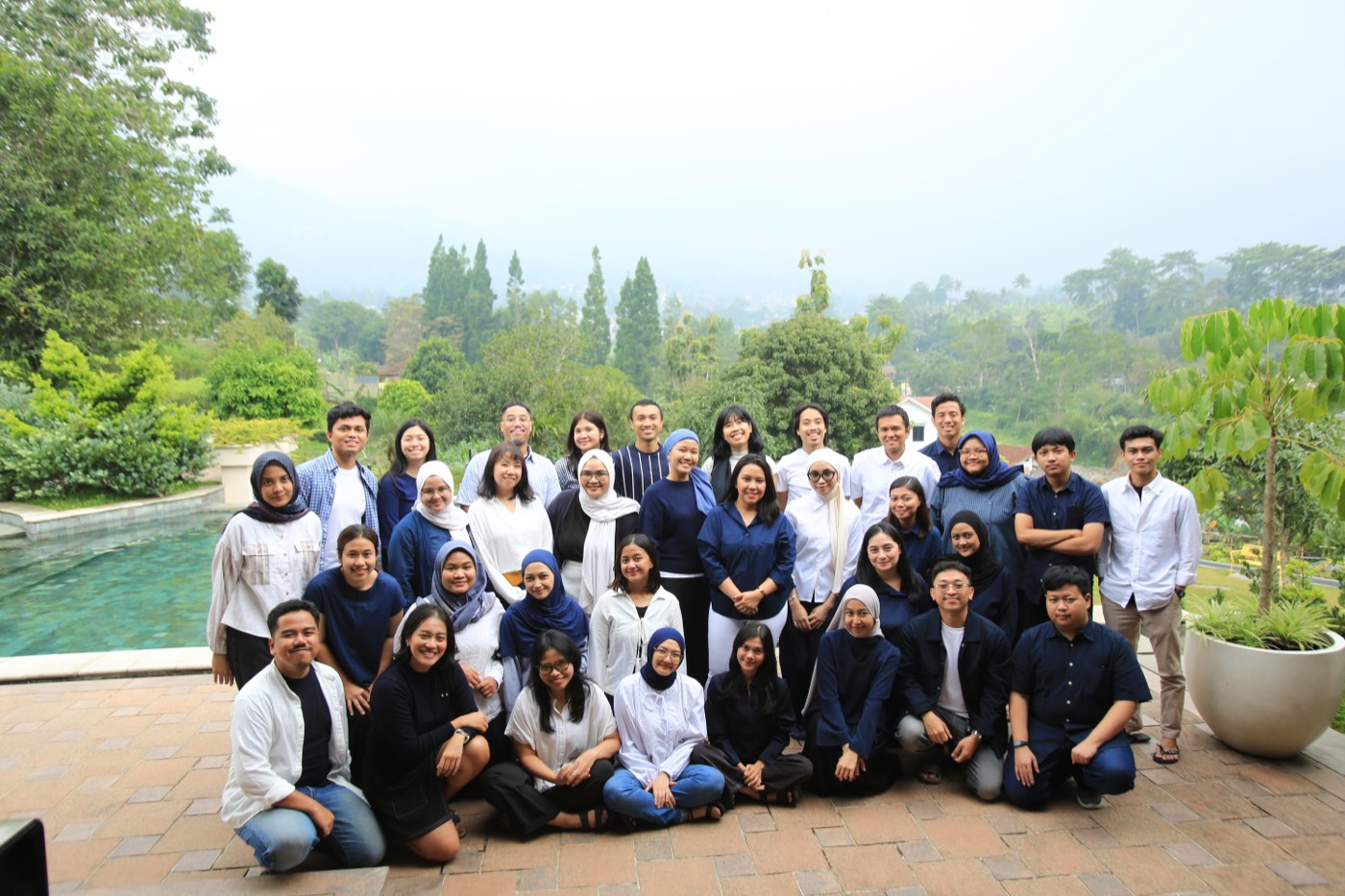 The Think Policy community together in a garden